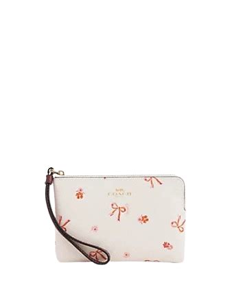 Corner Zip Wristlet With Bow Print .